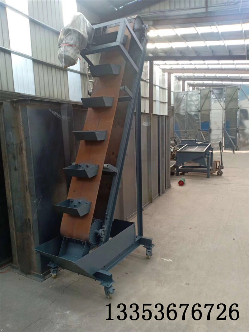傾斜皮帶斗式提升機(jī) 傾斜皮帶斗式提升機(jī)